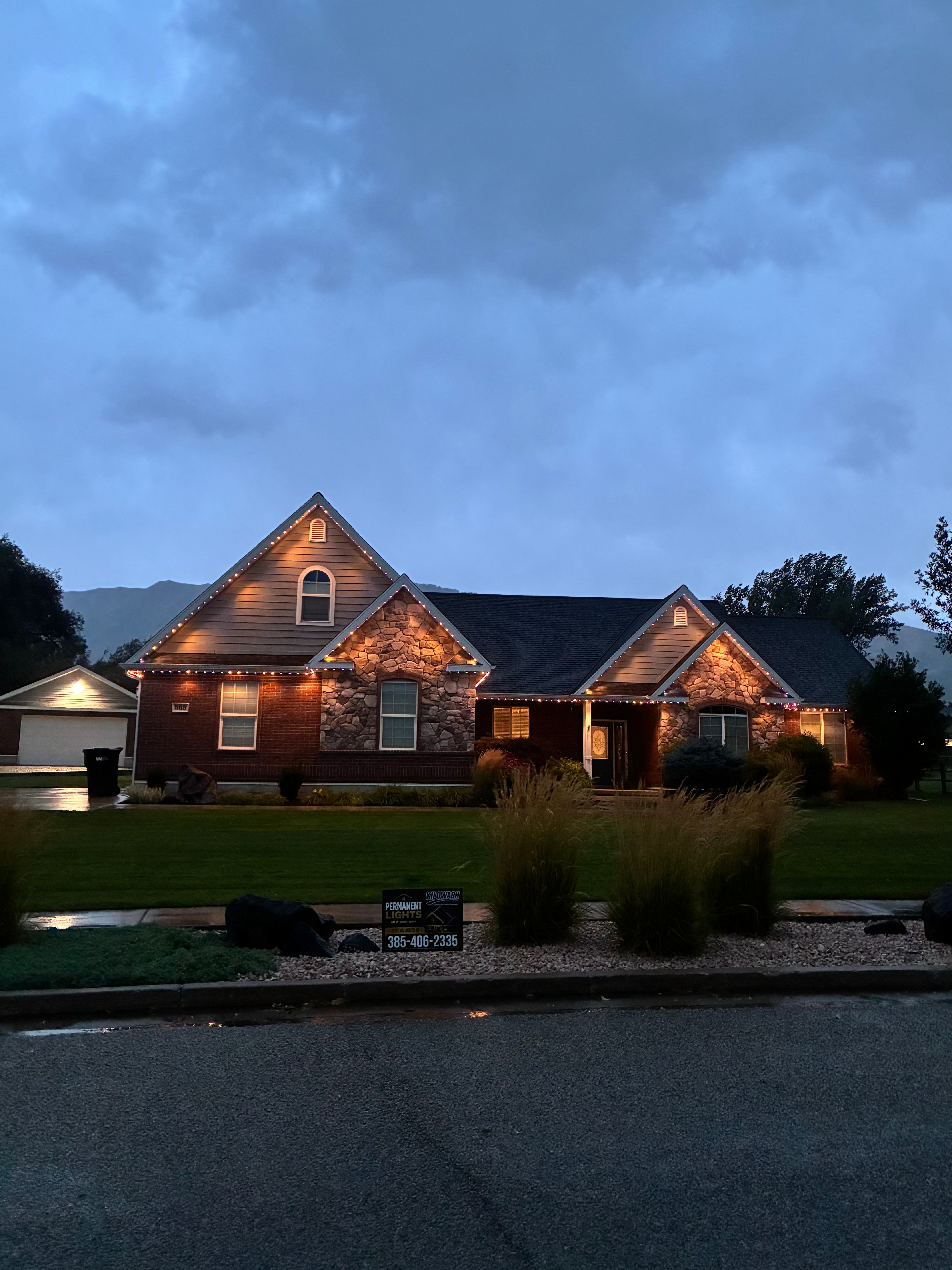 Warm white roofline & stone accents